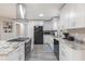 Modern kitchen with white cabinets and granite at 26117 Newcombe, Leesburg, FL 34748