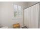 Clean bathroom with shower and window at 2746 Se 19Th Ct, Ocala, FL 34471