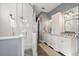 Spa-like bathroom with a walk-in shower and double vanity at 2746 Se 19Th Ct, Ocala, FL 34471