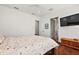 Main bedroom with hardwood floors and access to bathroom at 2746 Se 19Th Ct, Ocala, FL 34471
