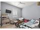 Cozy bedroom with a daybed and shelving at 2746 Se 19Th Ct, Ocala, FL 34471