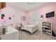 Bright bedroom with a single bed and desk at 2746 Se 19Th Ct, Ocala, FL 34471