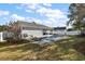 Large backyard pool surrounded by lush landscaping at 2746 Se 19Th Ct, Ocala, FL 34471