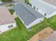 Aerial view of the house showcasing its gray roof and backyard at 2806 Salamanca St, The Villages, FL 32162