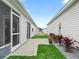 Private backyard patio with landscaping and gravel at 2806 Salamanca St, The Villages, FL 32162
