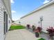 Private backyard patio with landscaping and gravel at 2806 Salamanca St, The Villages, FL 32162