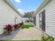 Private backyard patio with landscaping and gravel at 2806 Salamanca St, The Villages, FL 32162