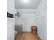 Walk-in closet with wire shelving and ample hanging space at 2806 Salamanca St, The Villages, FL 32162