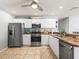 Modern kitchen featuring stainless steel appliances and ample counter space at 2806 Salamanca St, The Villages, FL 32162