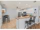 Kitchen with breakfast bar and modern cabinetry at 2806 Salamanca St, The Villages, FL 32162