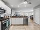 Modern kitchen features stainless steel appliances and ample counter space at 2806 Salamanca St, The Villages, FL 32162