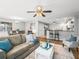 Comfortable living room featuring a neutral color palette and hardwood floors at 2806 Salamanca St, The Villages, FL 32162