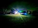 Aerial view of a house at night with colorful lights at 3180 Sixma Rd, Lake Helen, FL 32744