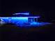 House exterior at night with blue lights at 3180 Sixma Rd, Lake Helen, FL 32744