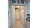 Bright hallway with tile flooring and access to multiple rooms at 3180 Sixma Rd, Lake Helen, FL 32744