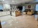 Open concept kitchen and living area at 3180 Sixma Rd, Lake Helen, FL 32744
