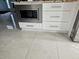 Built-in microwave and drawers in kitchen at 3180 Sixma Rd, Lake Helen, FL 32744