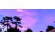 Vibrant sunset colors in the sky at 3180 Sixma Rd, Lake Helen, FL 32744