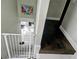 Elegant marble staircase with a baby gate at 3180 Sixma Rd, Lake Helen, FL 32744