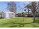 Spacious backyard with shed and access to the water at 35534 Quail Run, Leesburg, FL 34788