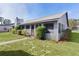 Charming single story home with a well-maintained lawn and landscaping at 35534 Quail Run, Leesburg, FL 34788
