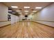 Spacious dance studio with wood floors and mirrors at 3610 Rollingbrook St, Clermont, FL 34711
