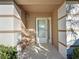 Inviting front entrance with a glass door and sidelights at 3610 Rollingbrook St, Clermont, FL 34711