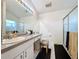 Clean bathroom with a vanity, shower, and toilet at 3817 Doune Way, Clermont, FL 34711