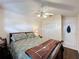 Bedroom with double door closet and ceiling fan at 3817 Doune Way, Clermont, FL 34711