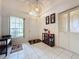 Bright entryway with tile floors and a decorative mirror at 3817 Doune Way, Clermont, FL 34711