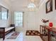 The entryway has tile floors, a bench, and decorative accents at 3817 Doune Way, Clermont, FL 34711