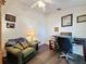 Home office with a desk, chair, and printer at 3817 Doune Way, Clermont, FL 34711