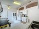 Kitchen with white cabinets and stainless steel appliances at 3817 Doune Way, Clermont, FL 34711