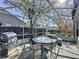 Screened patio with outdoor furniture and a grill for entertaining at 3817 Doune Way, Clermont, FL 34711