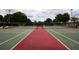 Two well-maintained tennis courts, perfect for recreation at 3817 Doune Way, Clermont, FL 34711