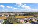 A beautiful aerial view shows the neighborhood and surrounding landscape near a home at 3839 Manor Oaks Ct, Leesburg, FL 34748