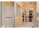 Main bathroom with shower, toilet and access to bedroom at 5305 Indian Ocean Loop, Tavares, FL 32778