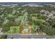 Aerial view showing home's location and surrounding area at 703 & 705 Cleveland Ave, Wildwood, FL 34785