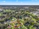 Aerial view of a two-house property with large yard at 703 & 705 Cleveland Ave, Wildwood, FL 34785