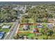 Aerial view of a property with two houses and large yard at 703 & 705 Cleveland Ave, Wildwood, FL 34785