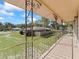 View from balcony overlooking backyard and neighborhood at 703 & 705 Cleveland Ave, Wildwood, FL 34785