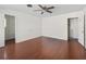 Spacious bedroom with hardwood floors and two closets at 703 & 705 Cleveland Ave, Wildwood, FL 34785