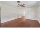 Bright living room with hardwood floors and a fireplace at 703 & 705 Cleveland Ave, Wildwood, FL 34785