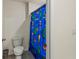 Clean bathroom with toilet and shower/tub combo at 8511 Triumph Cir, Wildwood, FL 34785