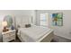 Cozy bedroom with a queen-size bed and ample closet space at 8511 Triumph Cir, Wildwood, FL 34785