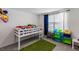 bedroom with a built-in bed and colorful rug at 8511 Triumph Cir, Wildwood, FL 34785