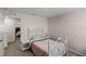 Charming bedroom with a white metal bed frame at 8511 Triumph Cir, Wildwood, FL 34785