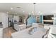 Modern kitchen with granite countertops and island at 8511 Triumph Cir, Wildwood, FL 34785