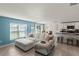 Open concept living room and kitchen area at 8511 Triumph Cir, Wildwood, FL 34785
