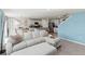 Open concept living area with sectional sofa at 8511 Triumph Cir, Wildwood, FL 34785
